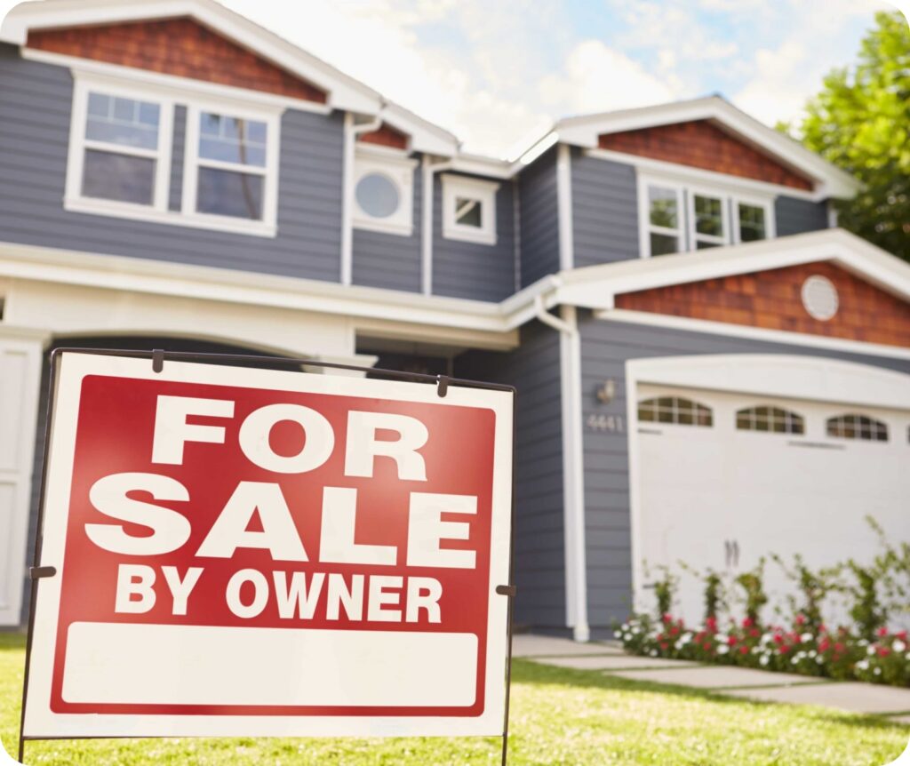 Home for sale by owner sign in front of suburban house
